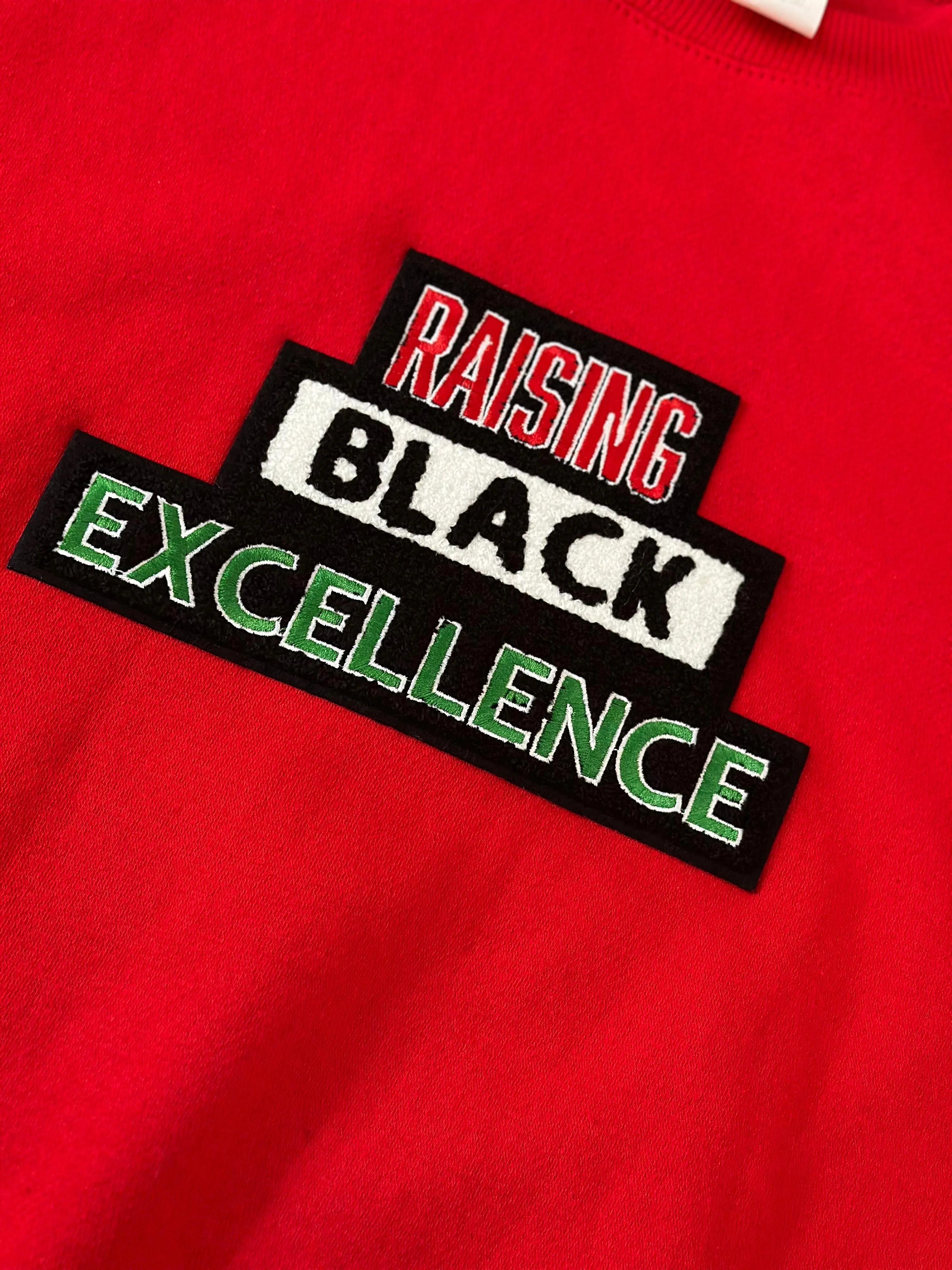 Raising Black Excellence Hoodie with Patch